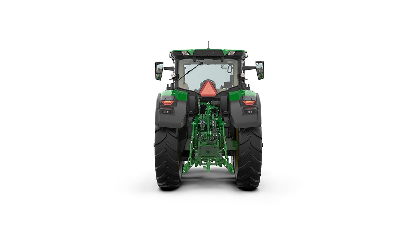 Studio shot of a rear-facing cabbed green tractor on a white background.