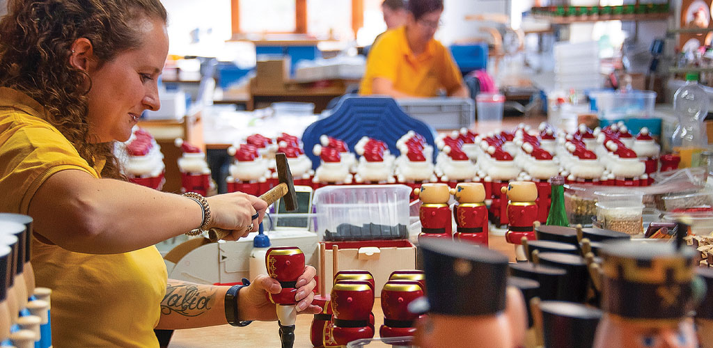 woman making christmas crafts