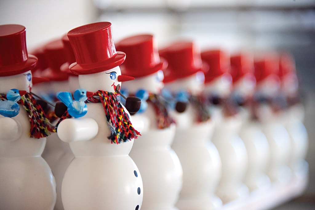 Row upon row of snowmen line up at one of the toy factories in Seiffen, Germany.