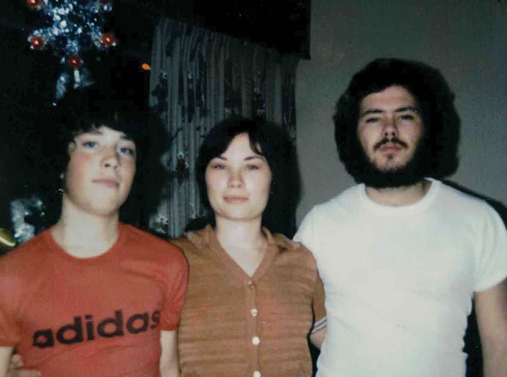 old family photo of three teens