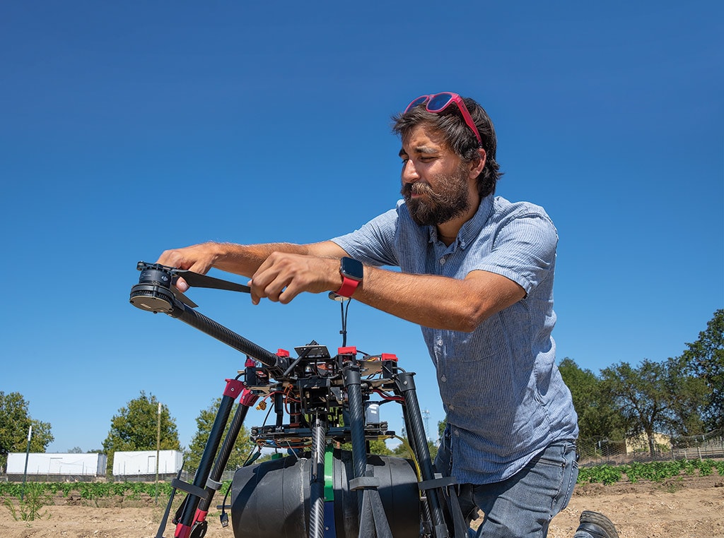 man with remote controlled drone