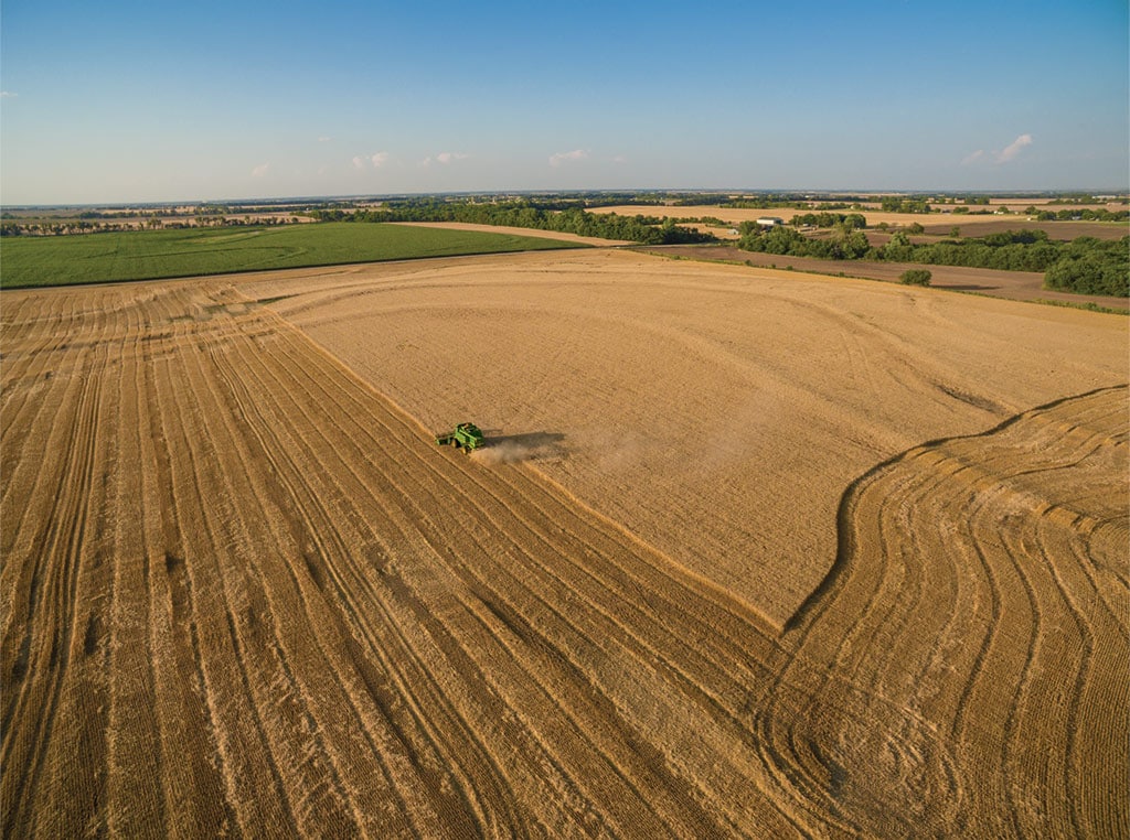 A Kansas wheat farmer shares highlights of a lifetime gathering farm magazine photos and stories. 