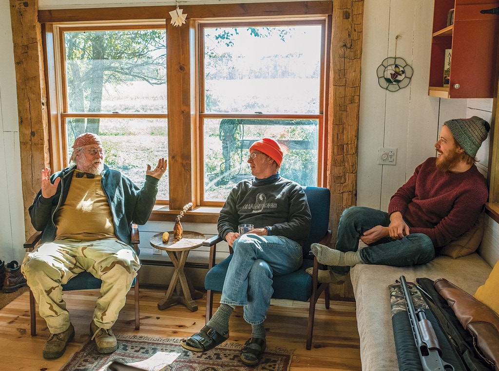 Men sitting around talking