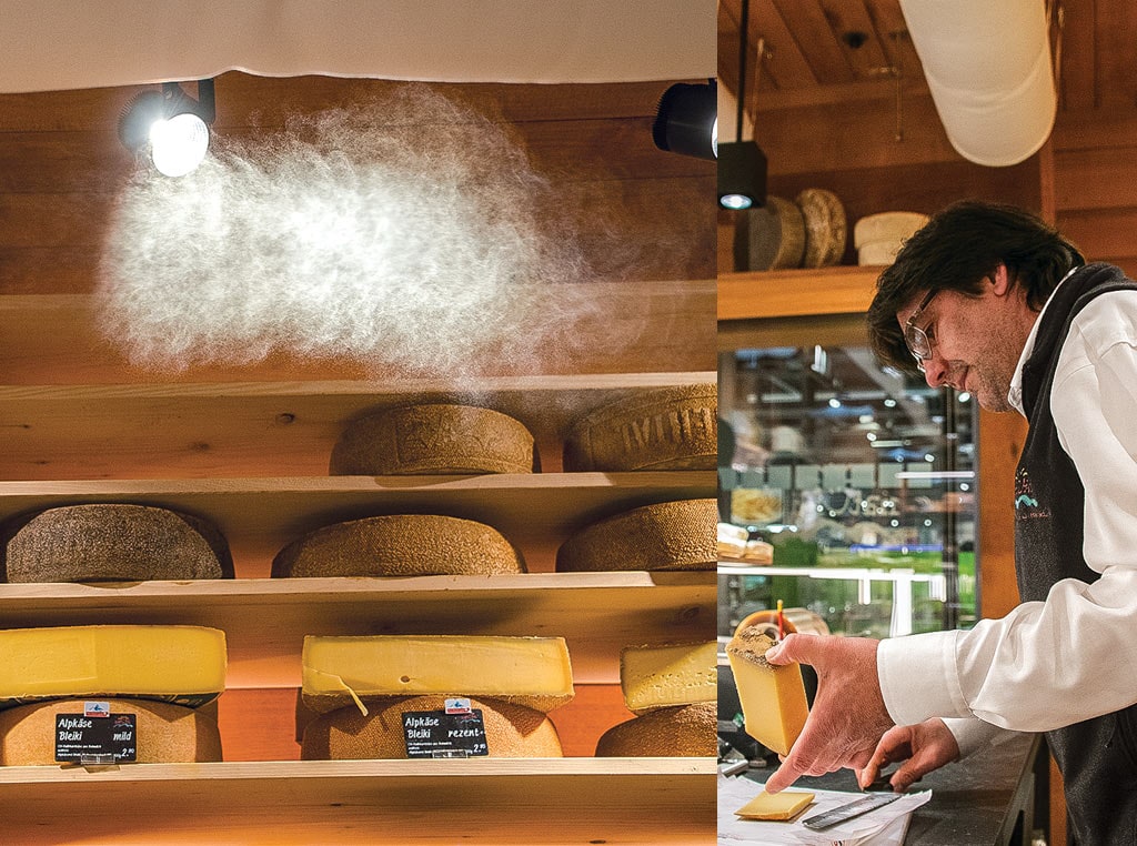 Cheese and man slicing cheese