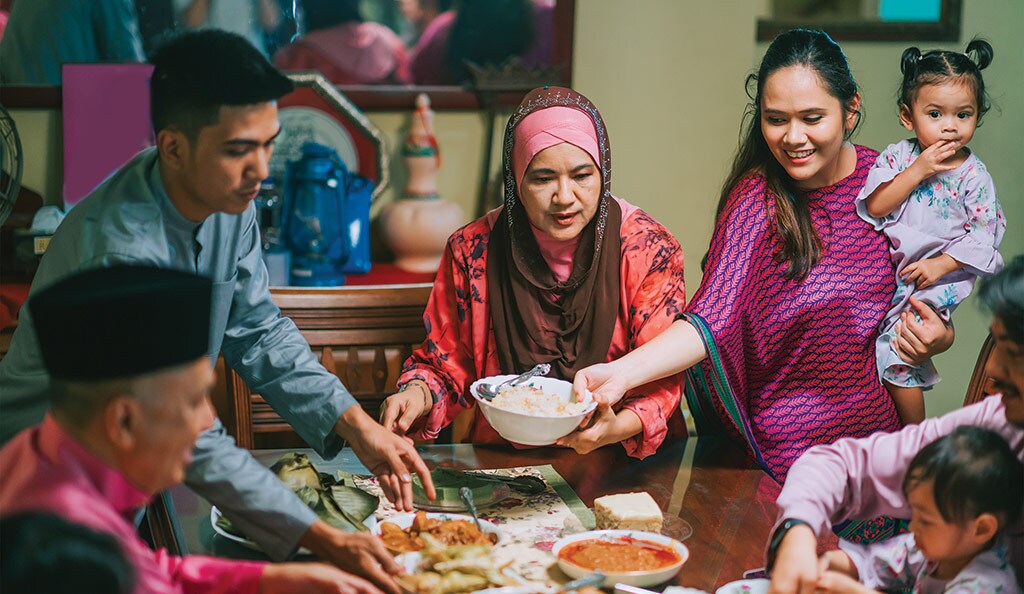 family serving dinner