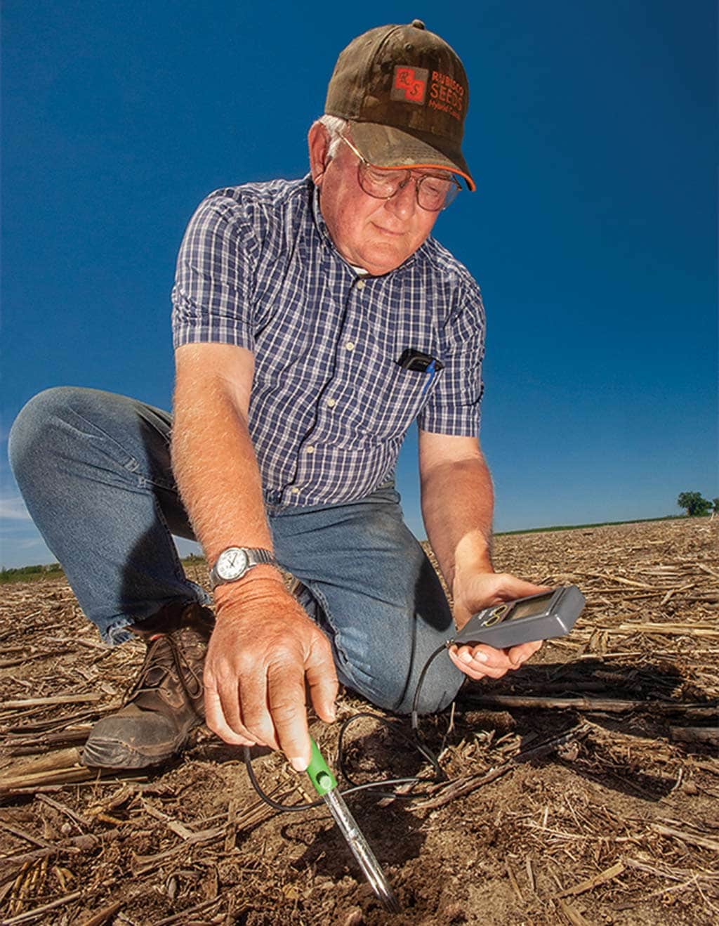 man testing the soil