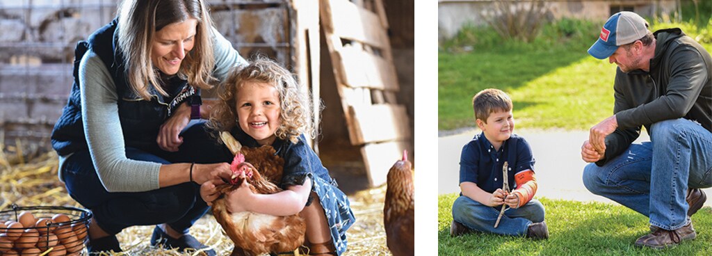 family in front of barn with chickens