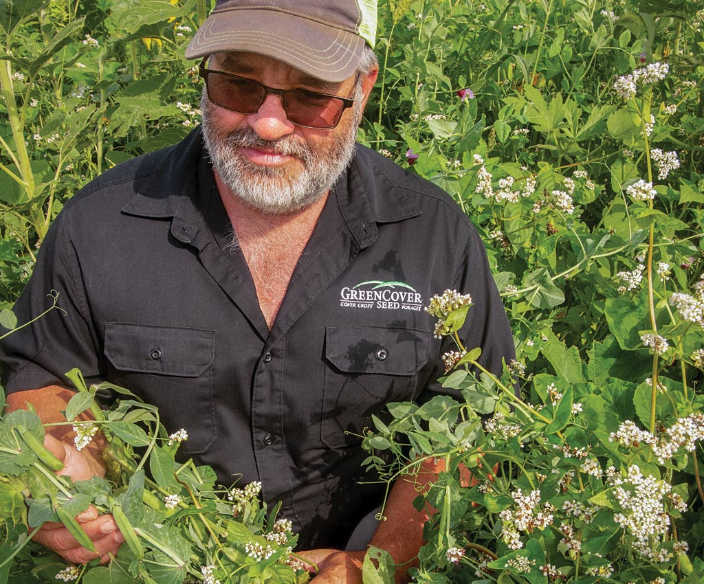 brian berns checking progress of plants