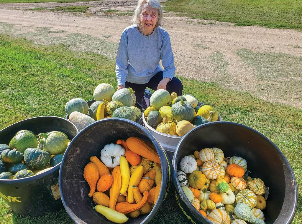 Lois showing plants