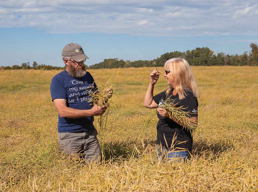 allison and mike in canola field