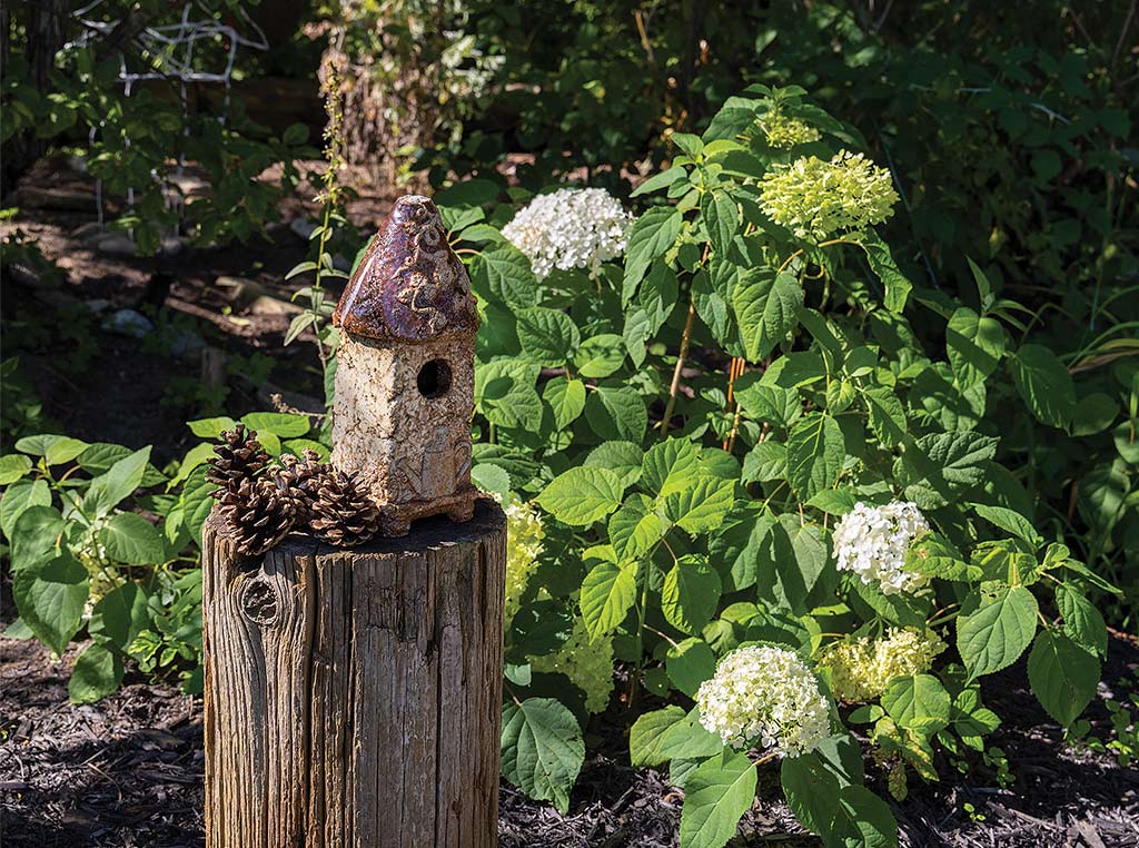 birdhouse on a stump