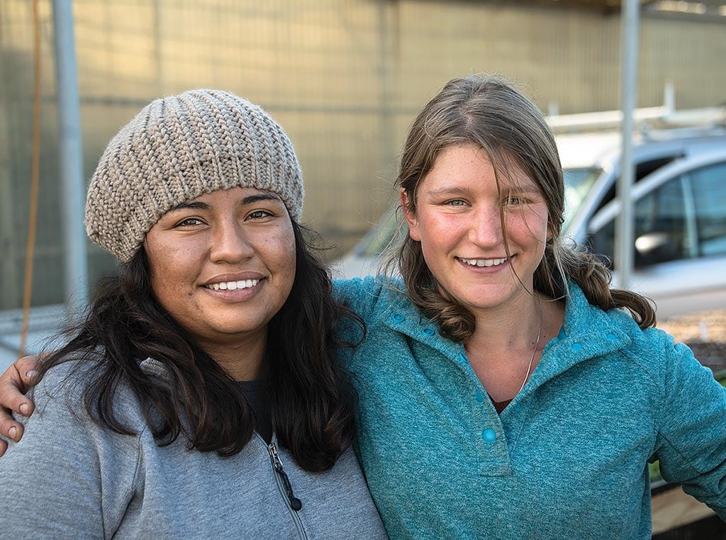 two people smiling