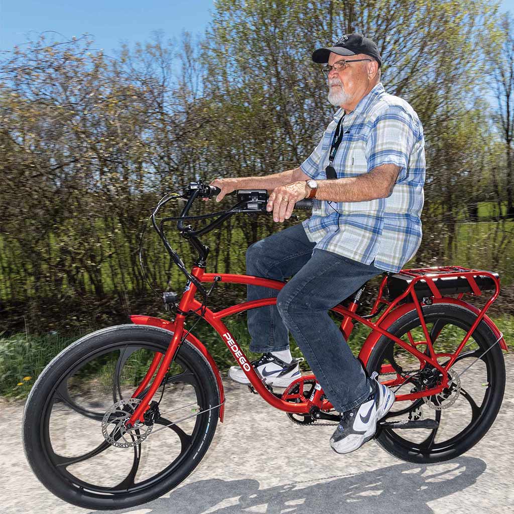 man riding e-bike