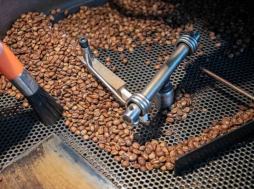 coffee beans on a roaster
