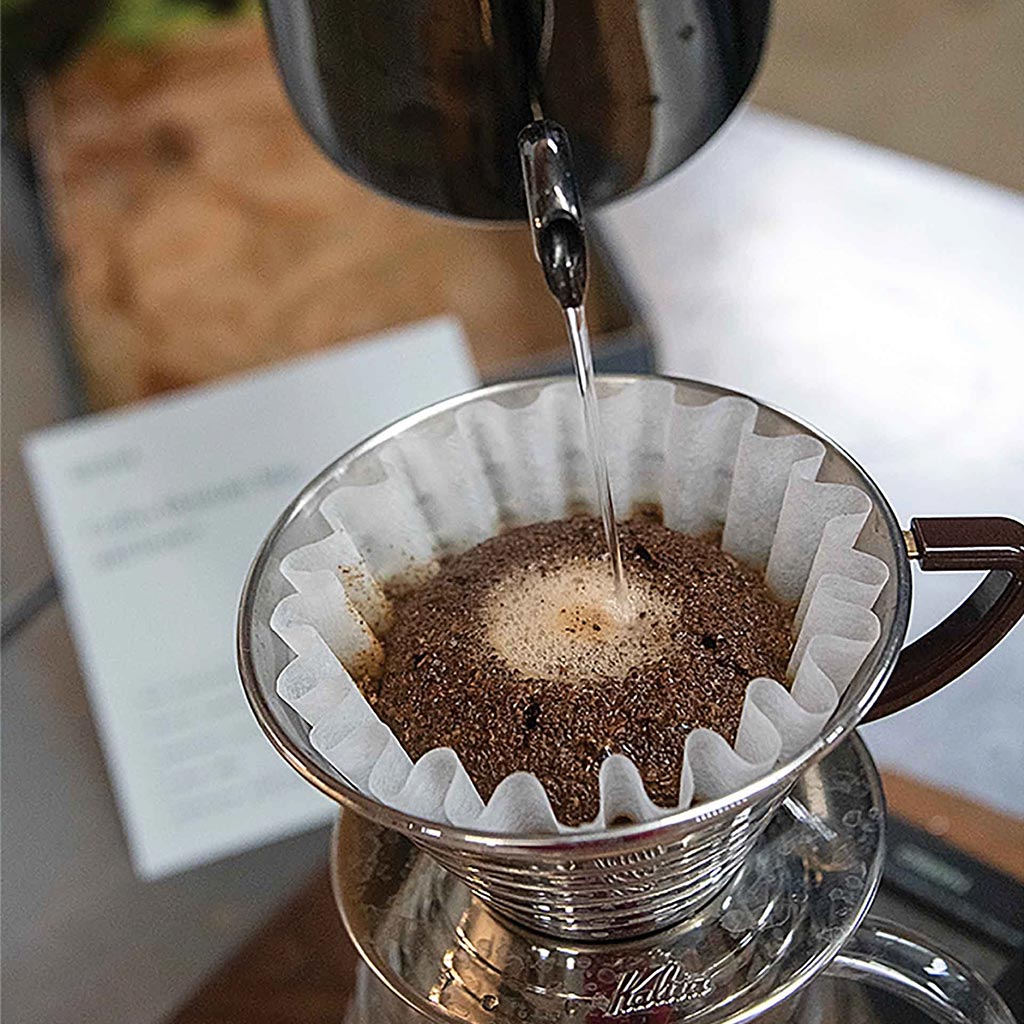 brewing pour over coffee