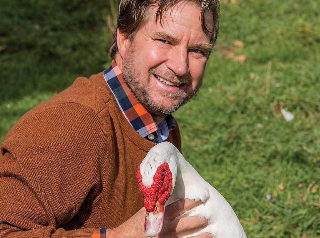 a man with his duck