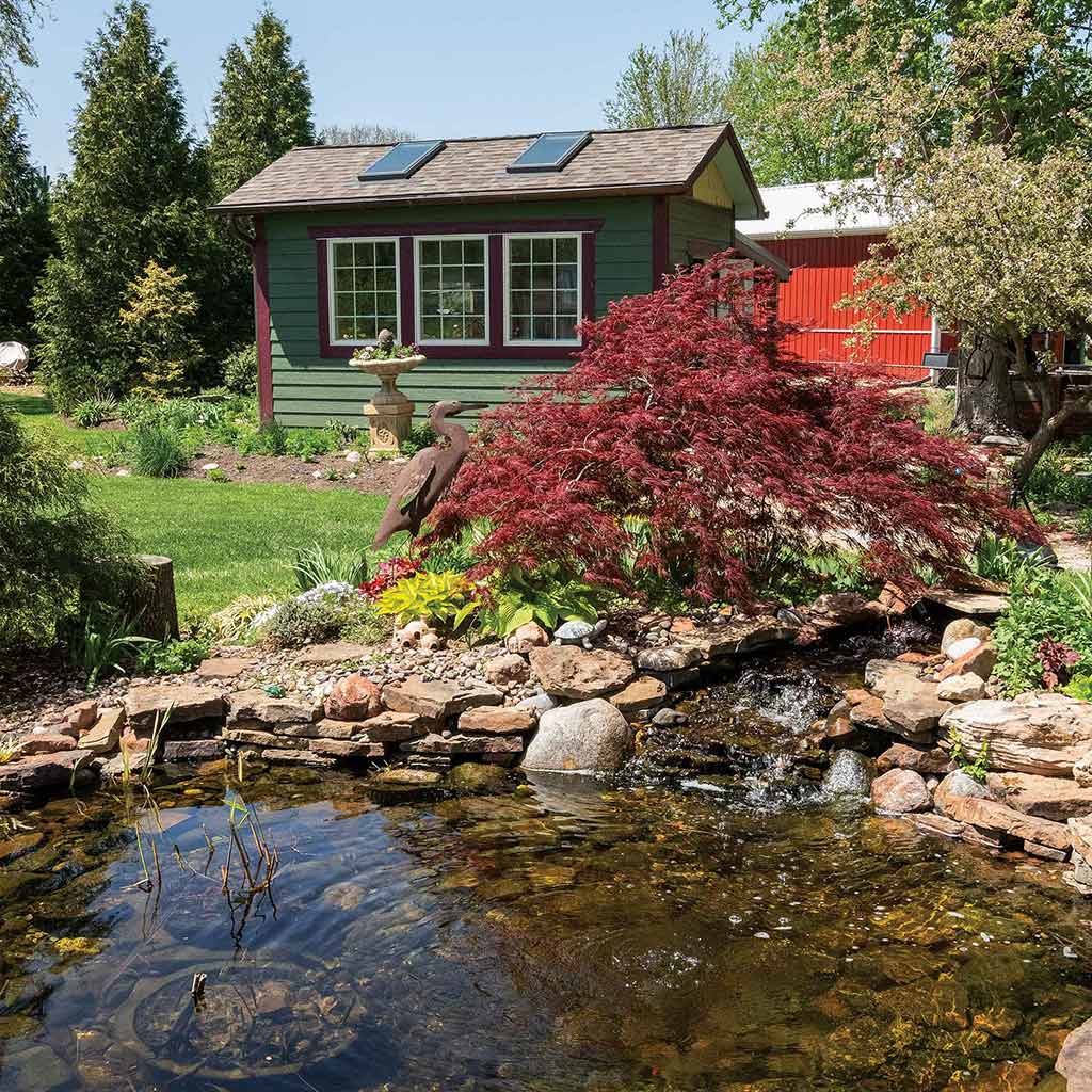 shed with pond in foreground