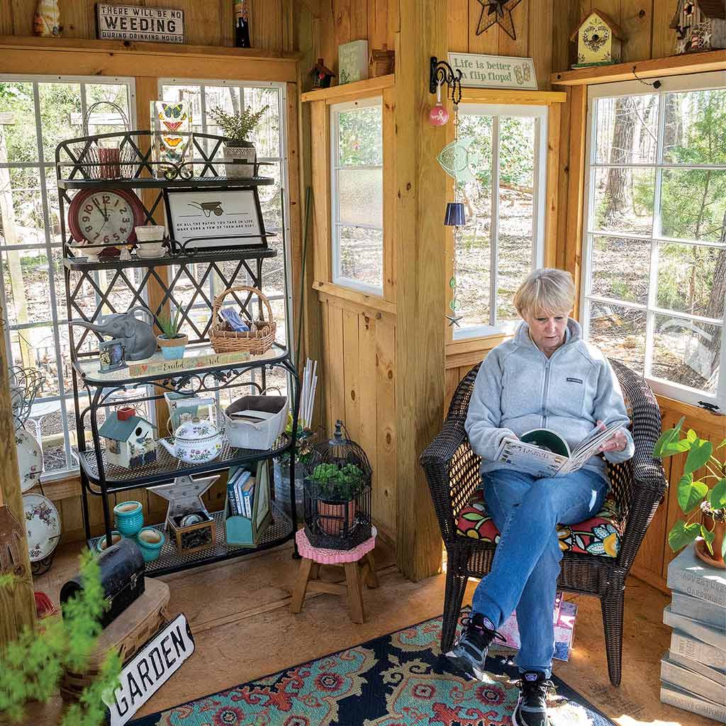 woman reading in her shed