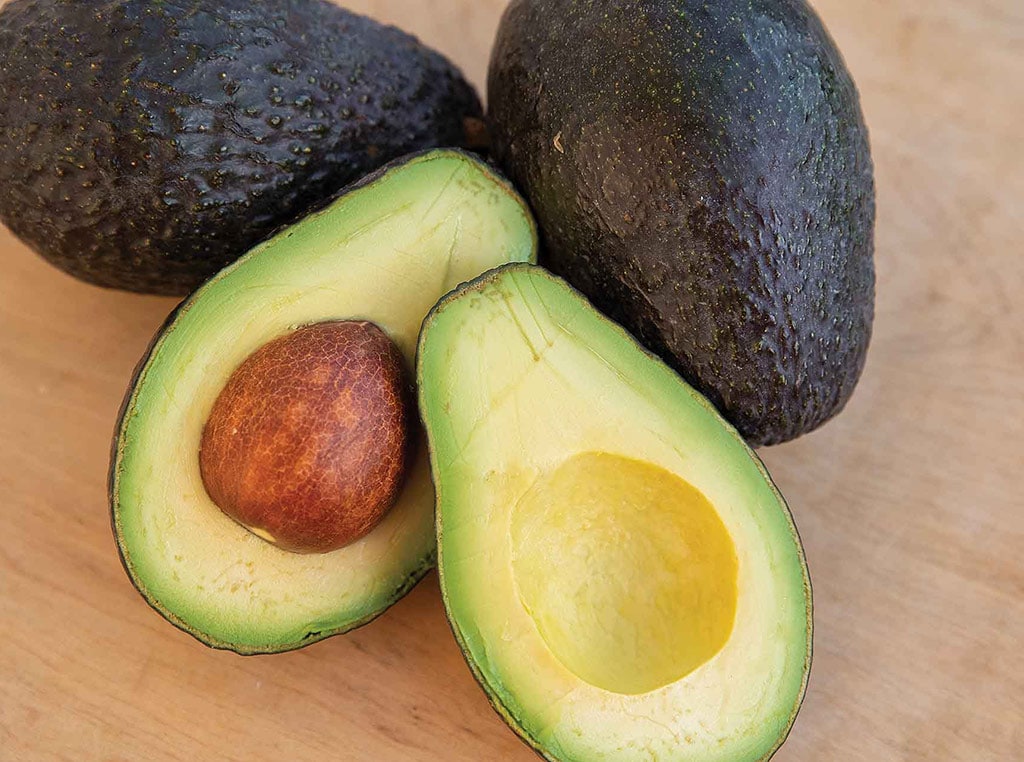 closeup of halved avocados
