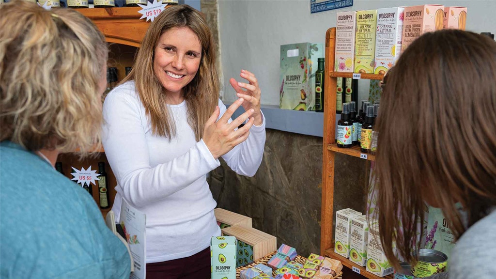 woman presenting avocado-based products