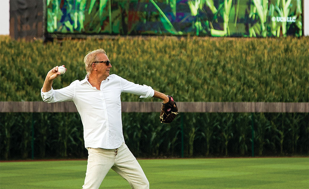 Kevin Costner throwing baseball in corn field