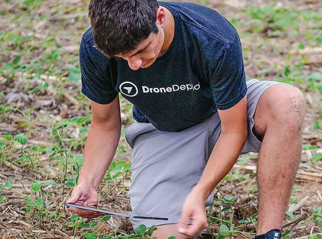 Man using device to work with data