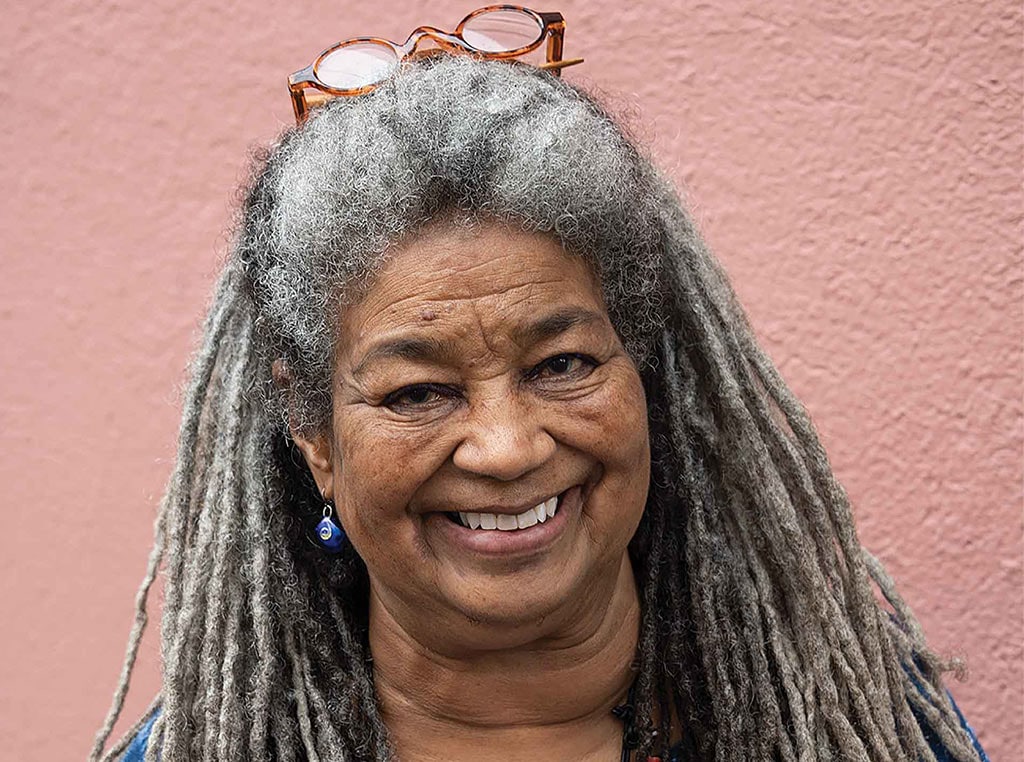 woman with dreadlocks smiling