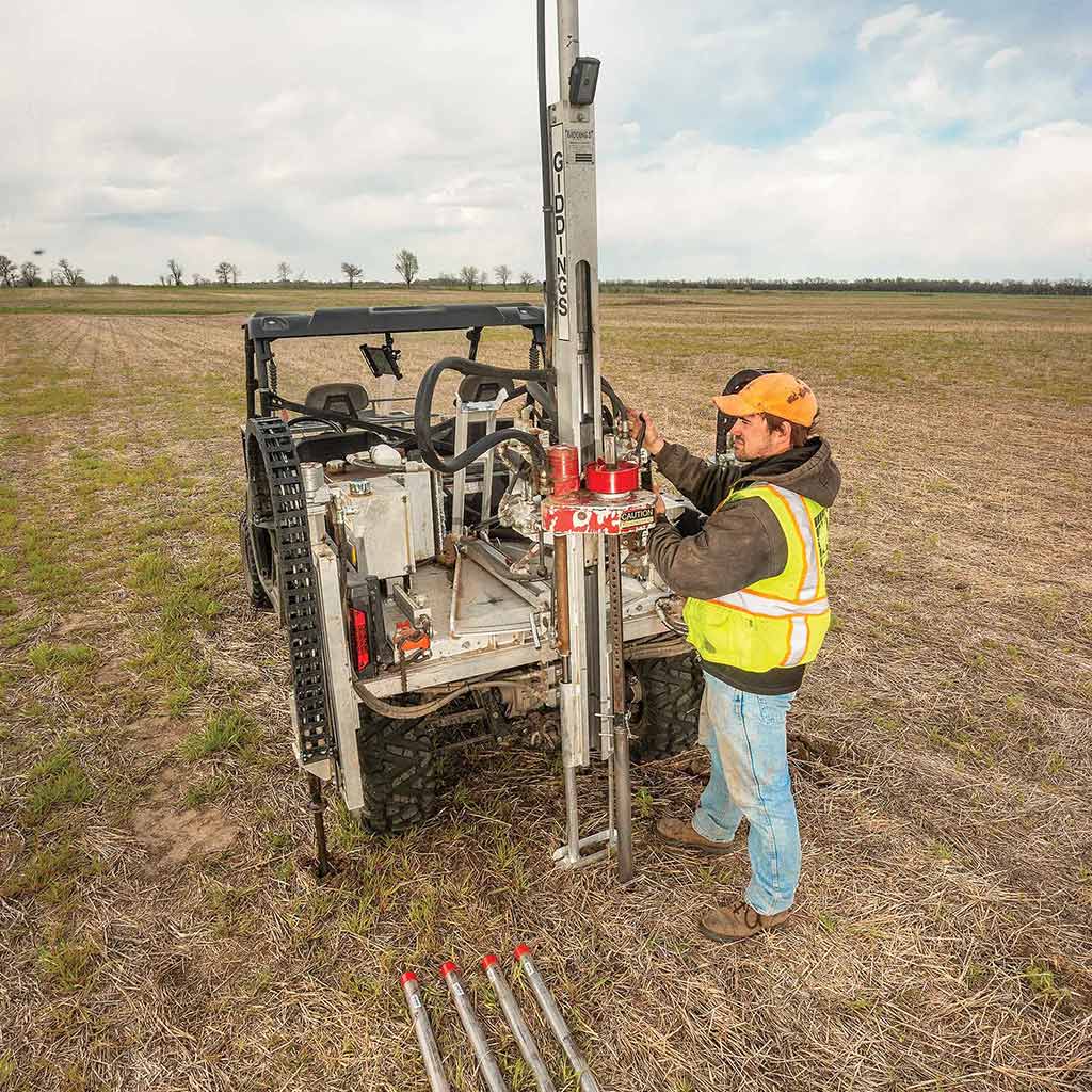 soil core sampling machine in action