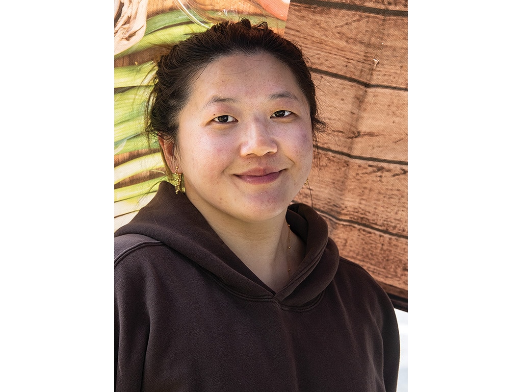  young lady wearing brown hoodie