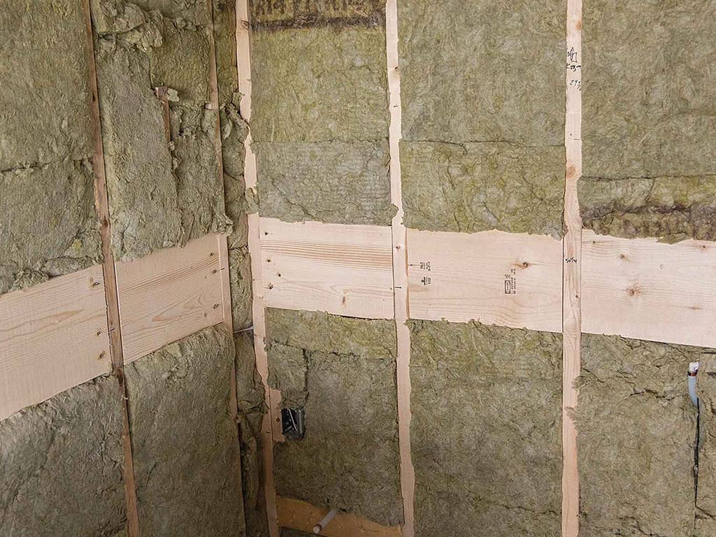 Installed backing on shower for support bars