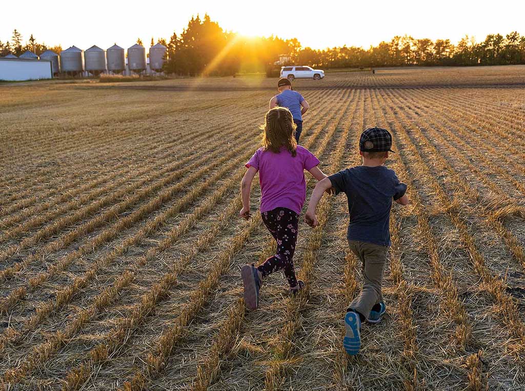 kids running in a field