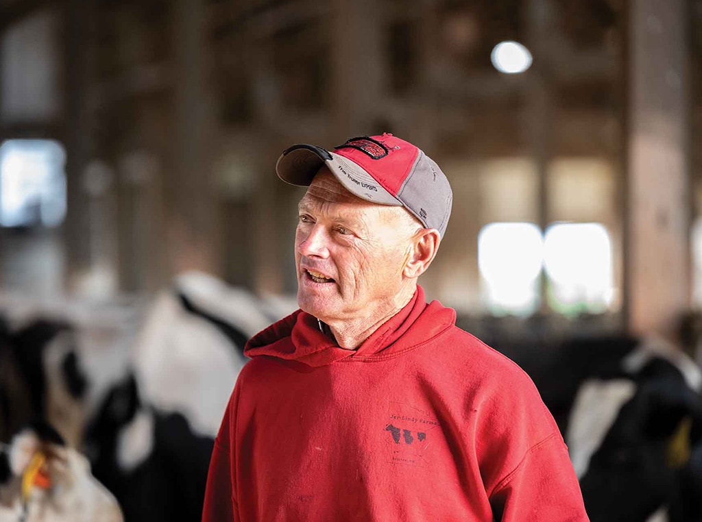 man in red baseball cap with red hoodie