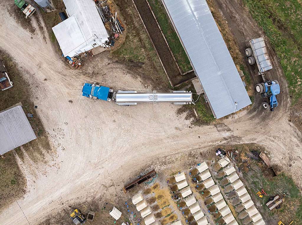 aerial view of tanker truck at dairy farm facility