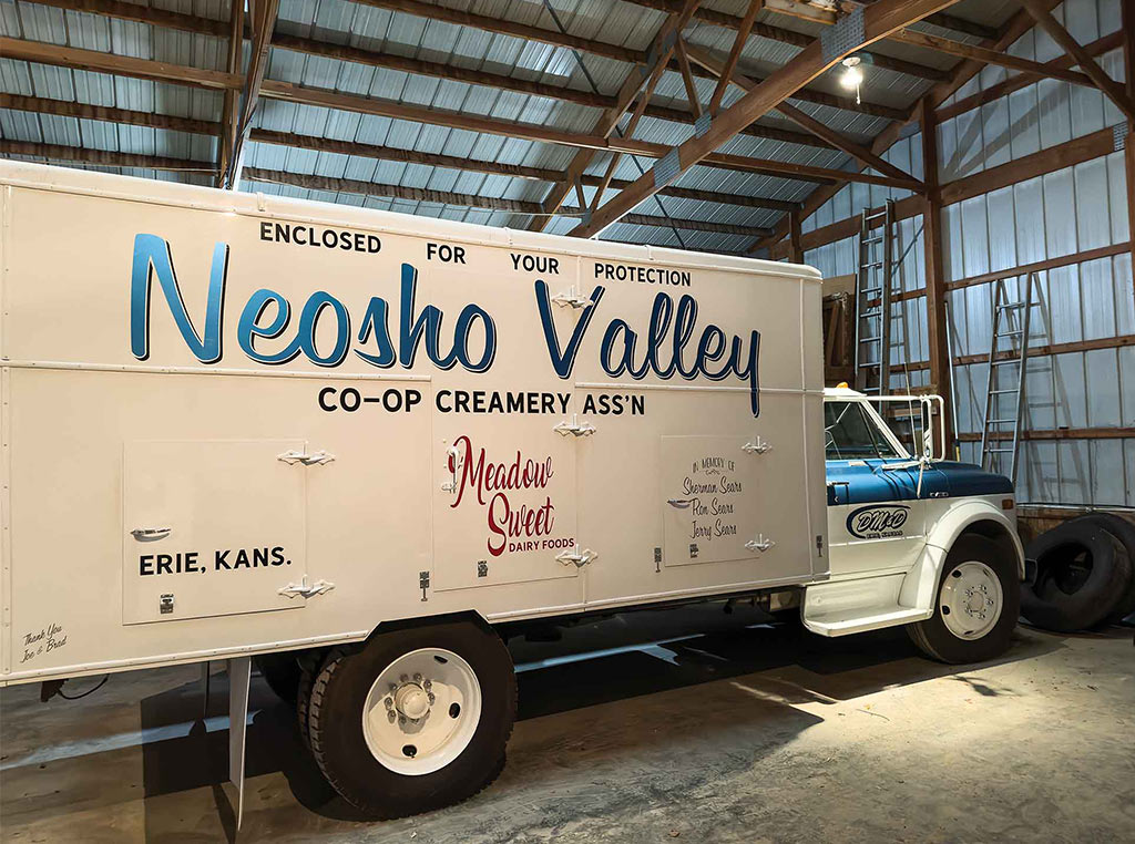 dairy delivery truck in warehouse garage