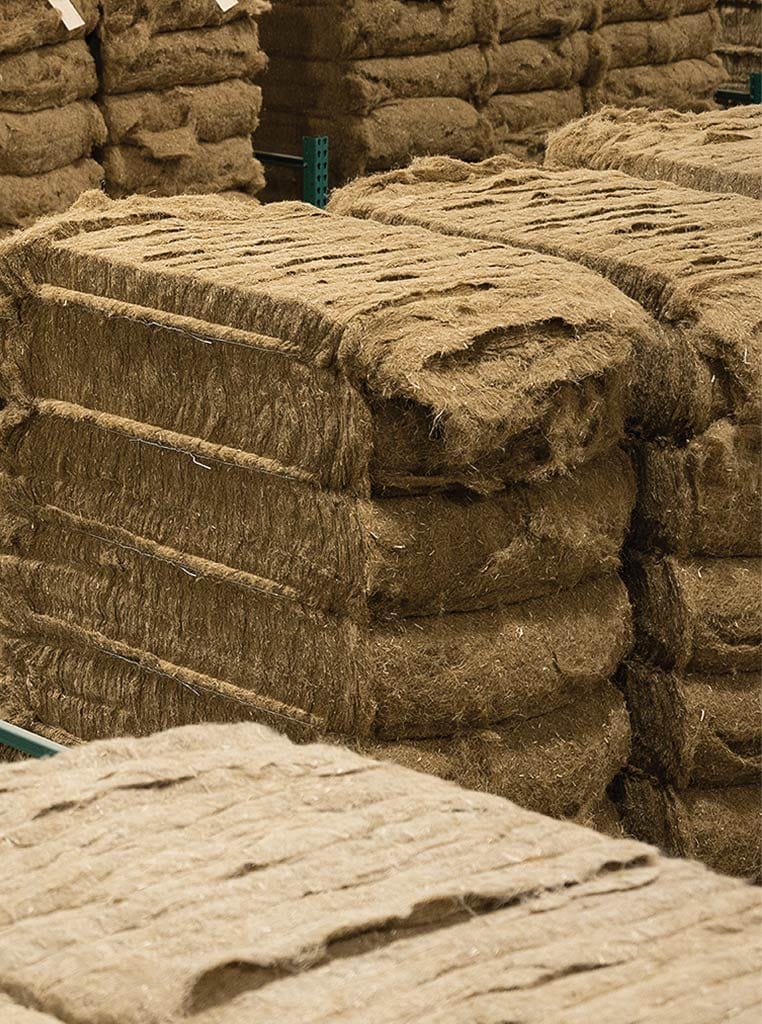 stacked bales of hemp fiber
