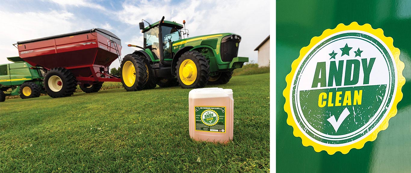 Deere tractor pulling wagon with gallon bottle of cleaning solution on grass in foreground and a green and yellow sticker that says Andy Clean with a checkmark