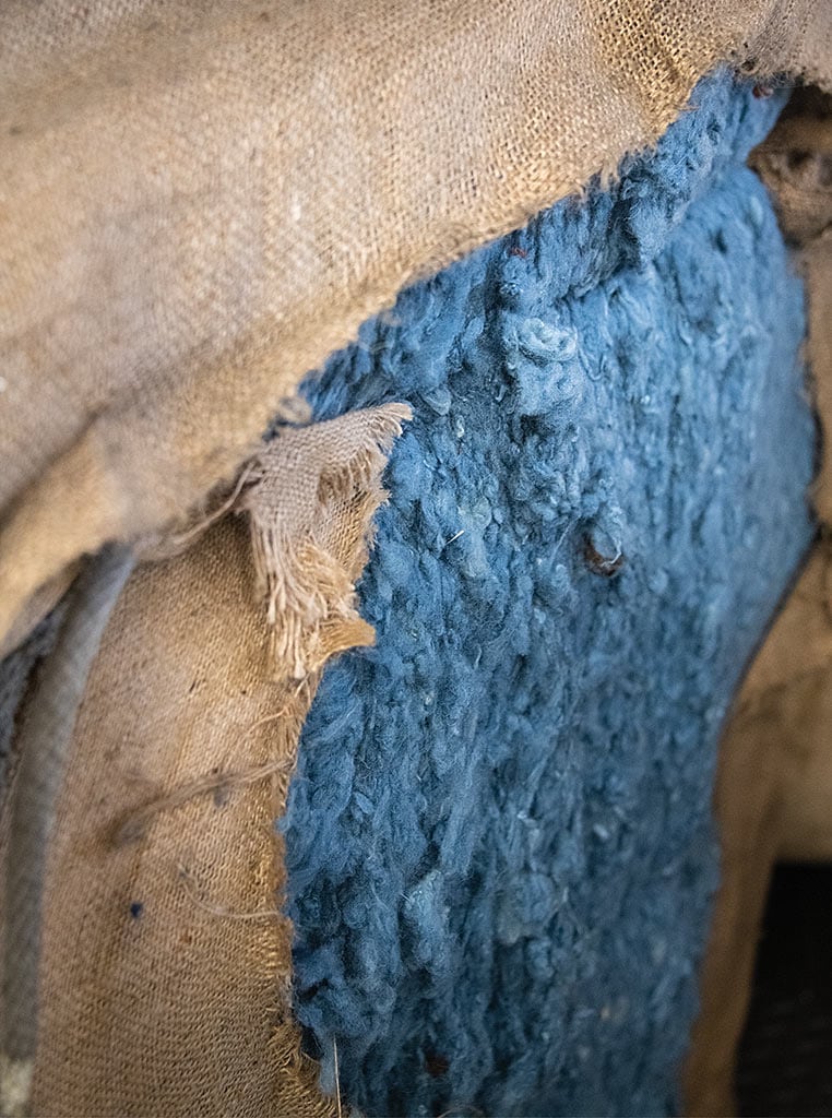 blue wool in burlap sack