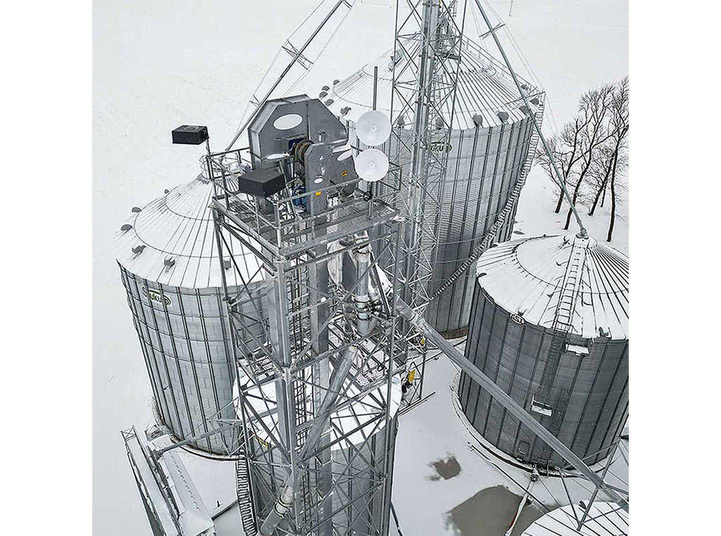 aerial view of silos covered in snow