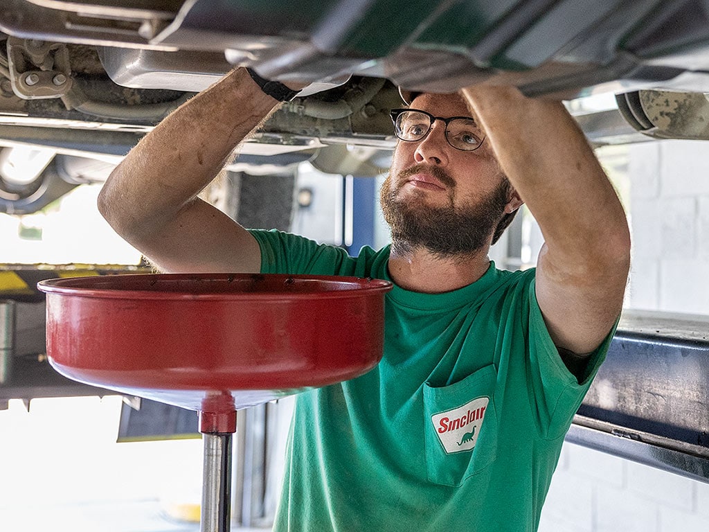 Auto Mechanic working on a truck 