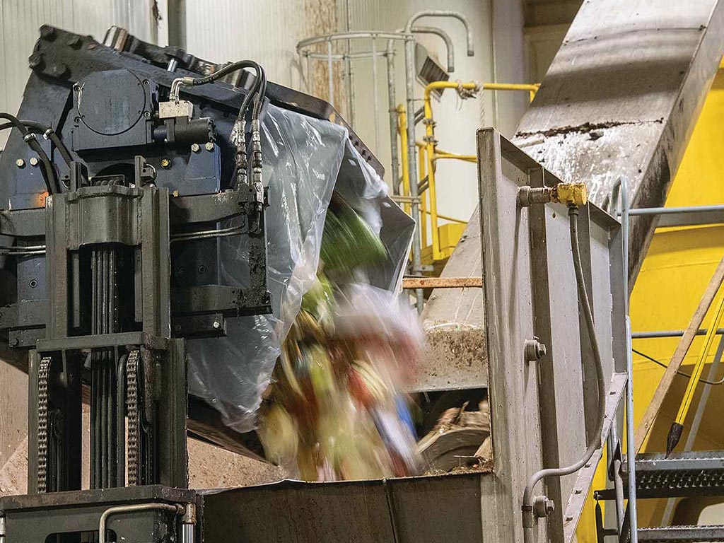 food waste processing machinery in action