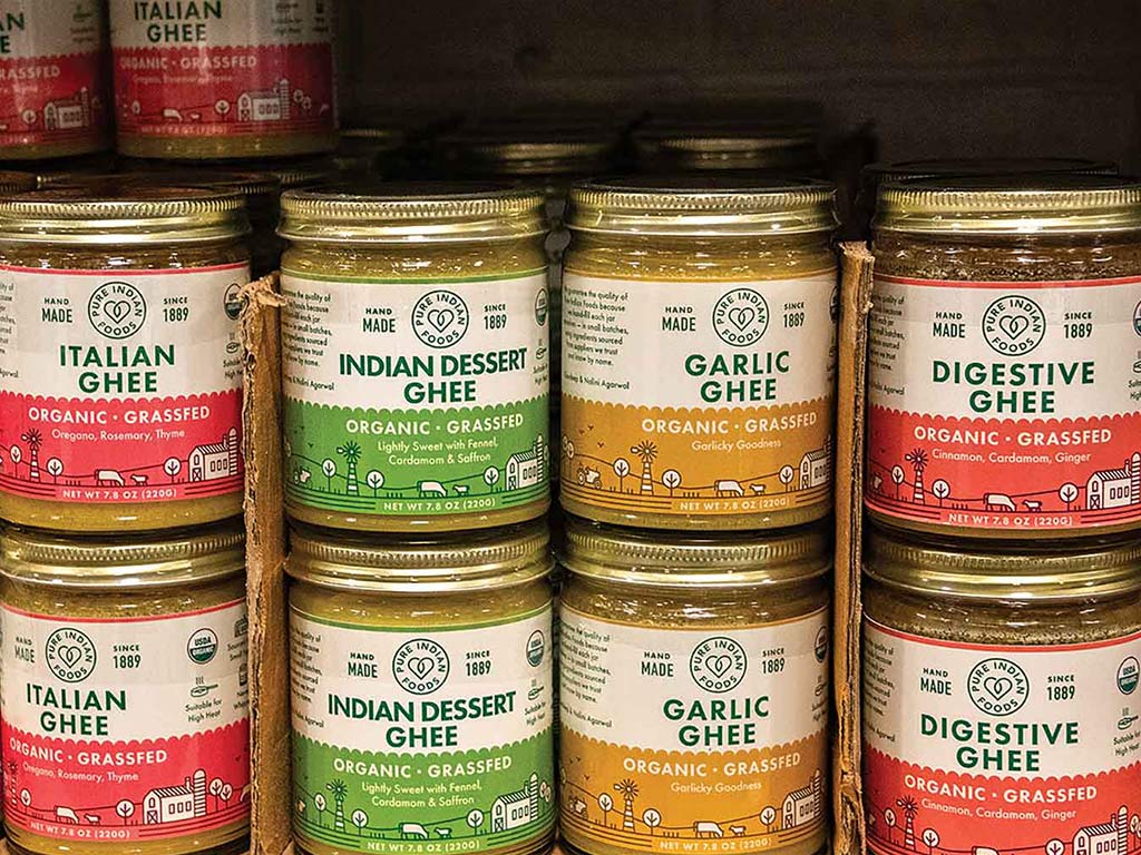 jars of ghee products on a supermarket shelf