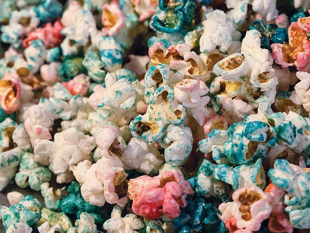 closeup of rainbow colored popped popcorn