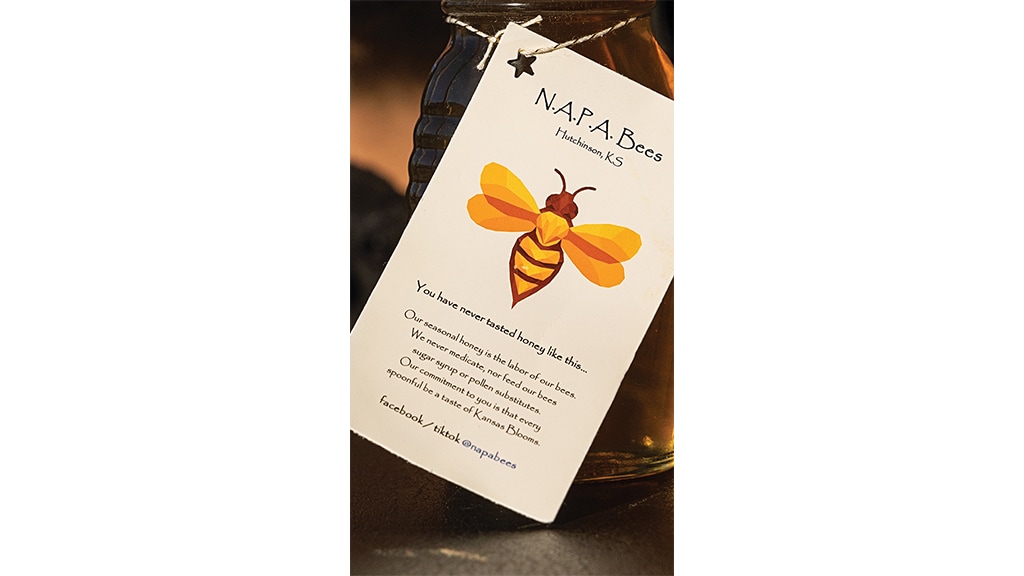 closeup of NAPA Bees product label tied to a honey jar