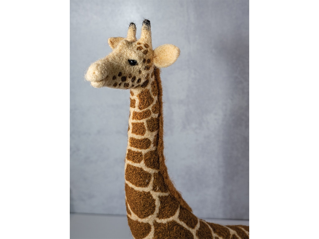 A wool giraffe stuffed animal