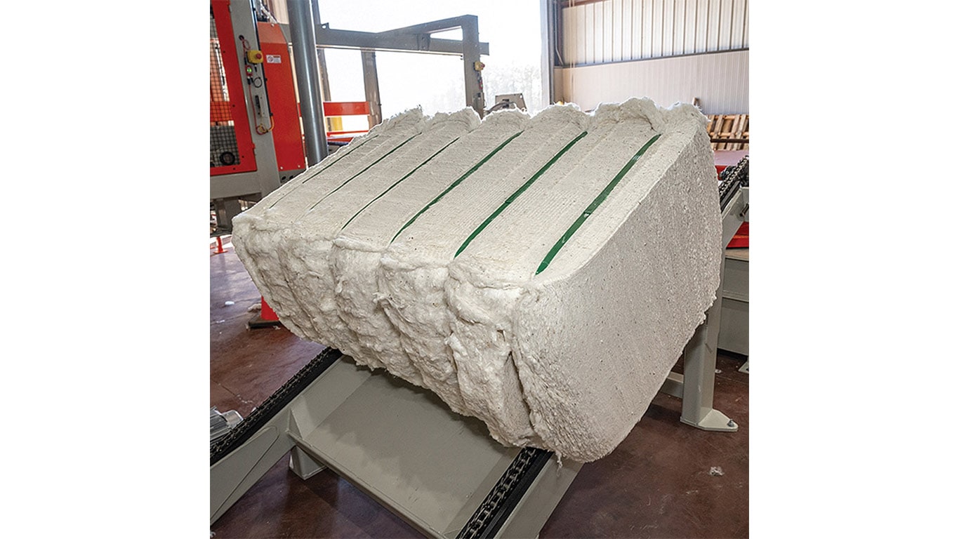 Rectangle cotton bale on a processing machine
