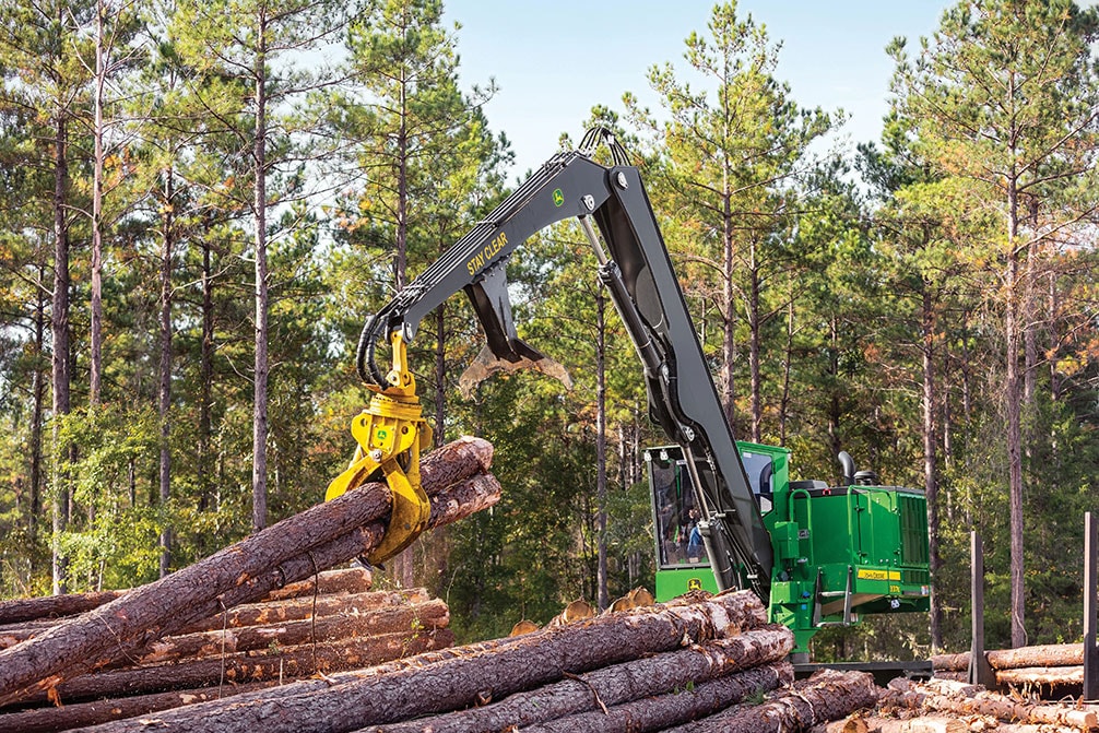 Large image of John Deere 337E Knuckleboom Loader in the woods